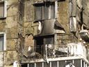 Fire damage on the exterior of a condo complex.